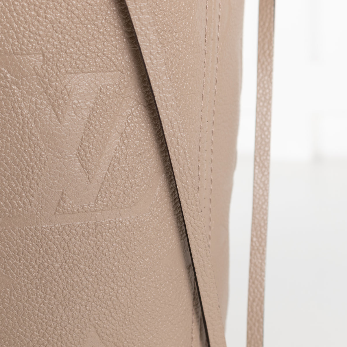 Louis Vuitton Beige Embossed Monogram Neverfull MM bag