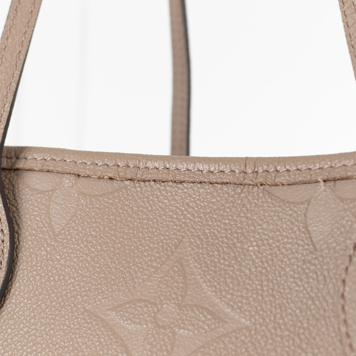 Louis Vuitton Beige Embossed Monogram Neverfull MM bag