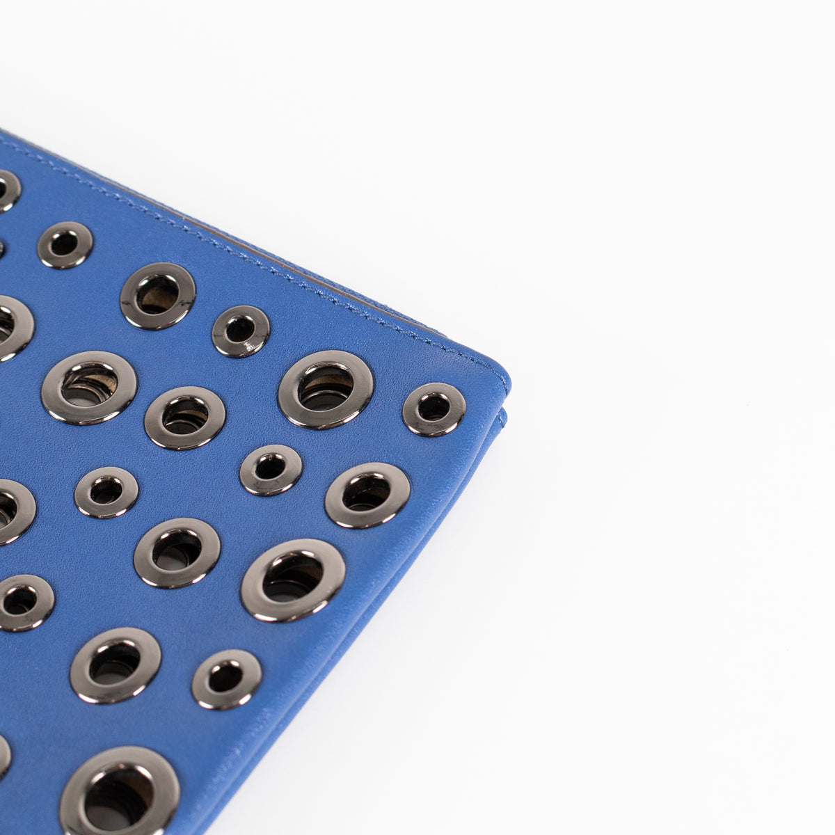 Anya Hindmarch Bright Blue Clutch with Gunmetal Eyelet Detailing