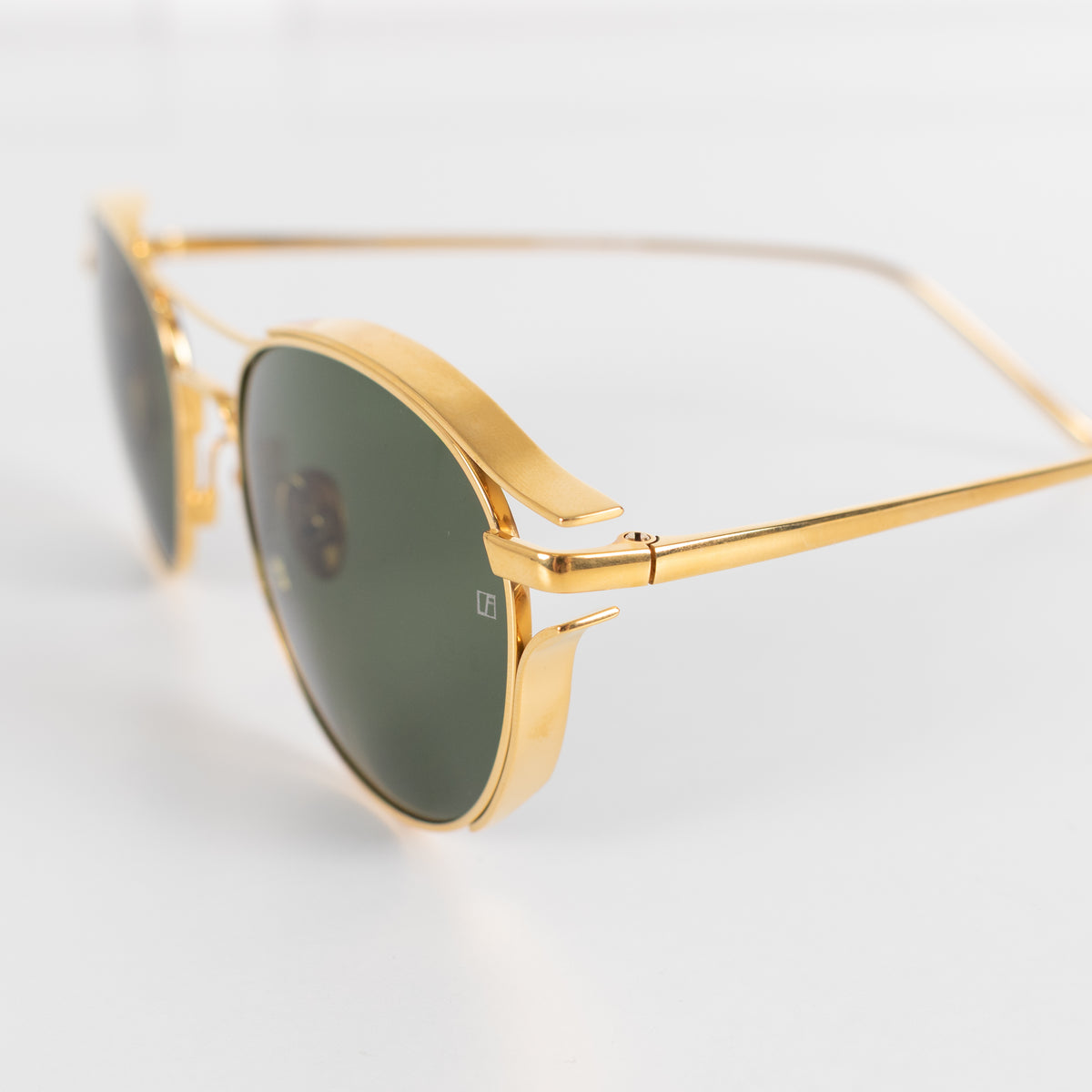 Linda Farrow Gold Titanium Round Sunglasses with Green Lens