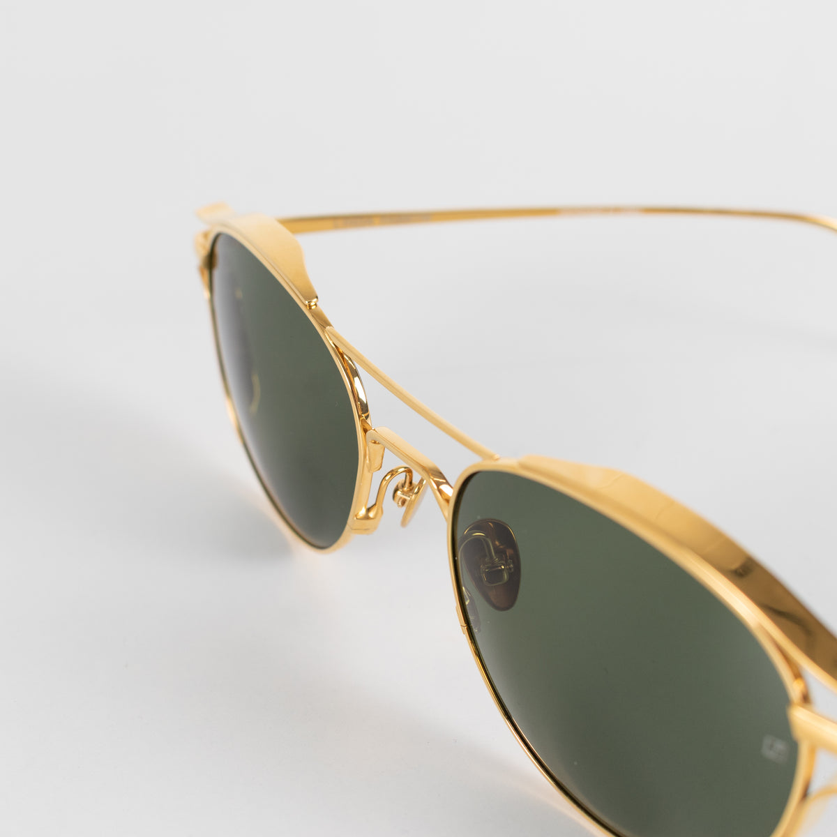 Linda Farrow Gold Titanium Round Sunglasses with Green Lens