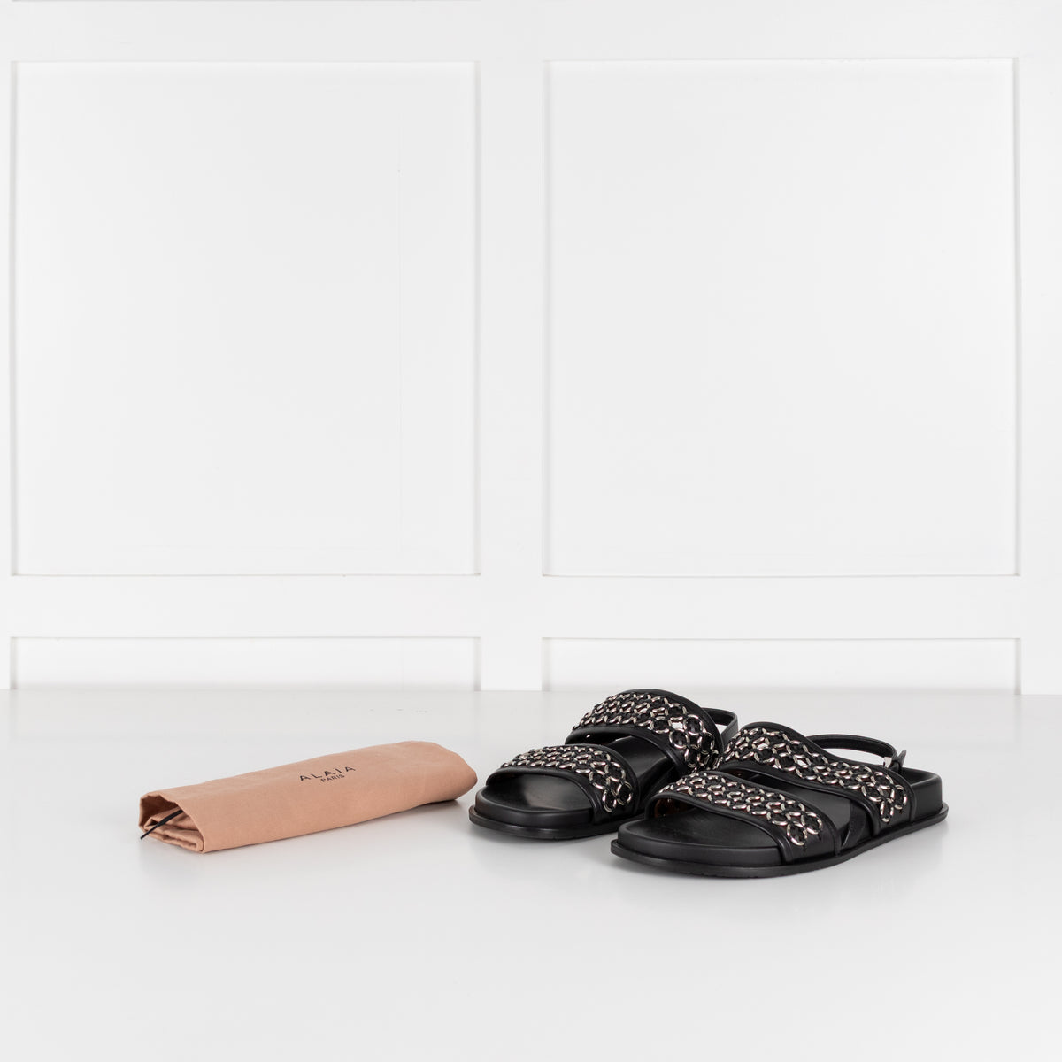 Alaia Black Leather Silver Eyelet Slingback Flat Sandals