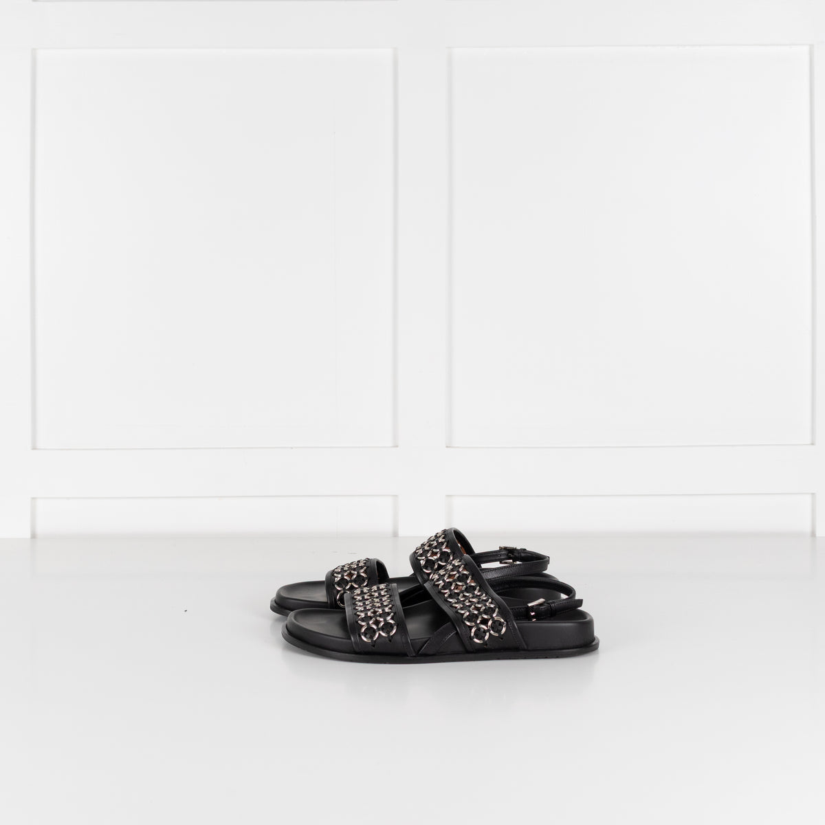 Alaia Black Leather Silver Eyelet Slingback Flat Sandals