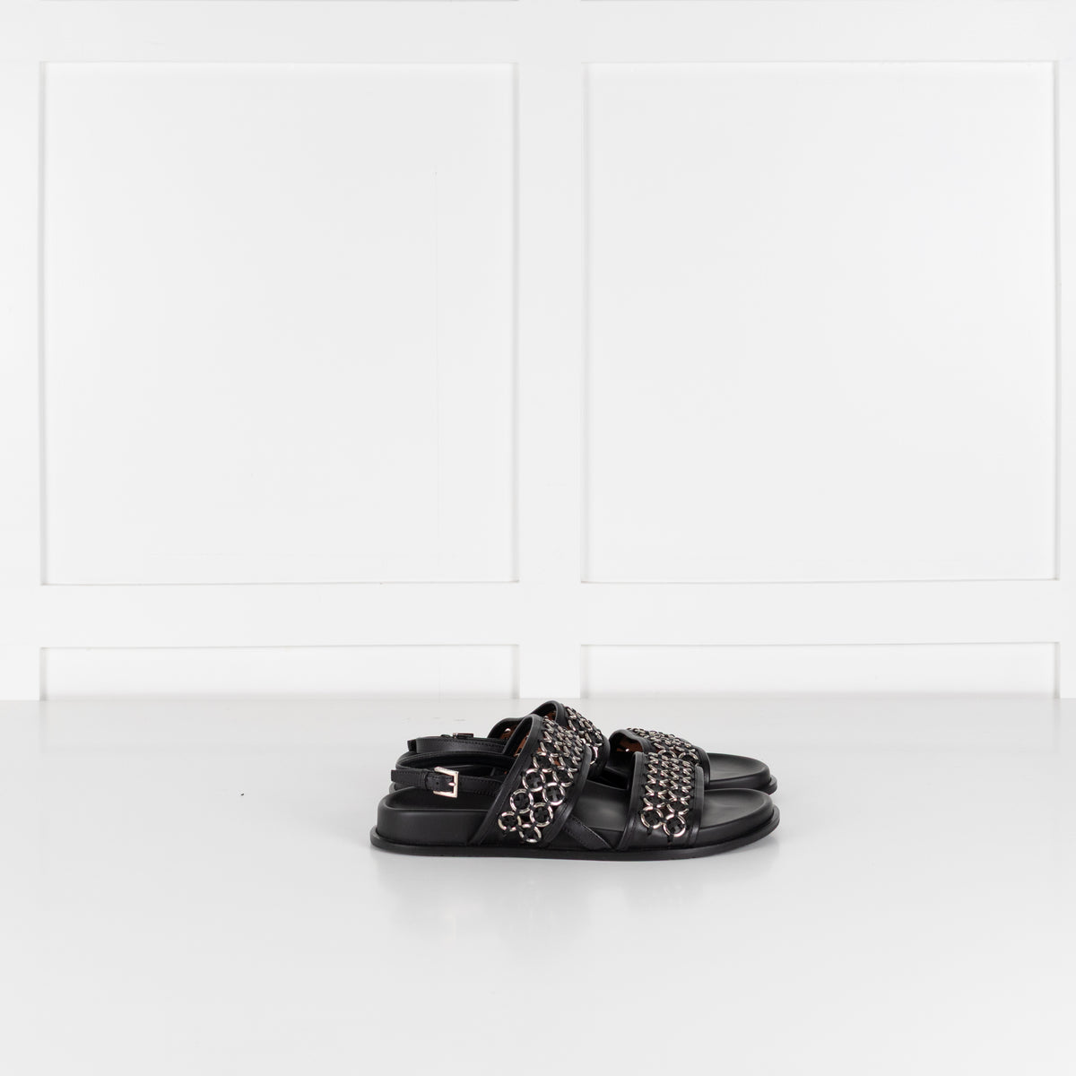 Alaia Black Leather Silver Eyelet Slingback Flat Sandals