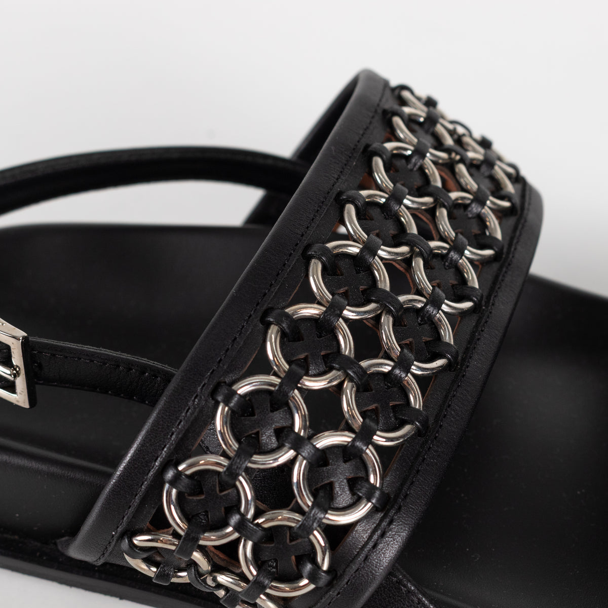 Alaia Black Leather Silver Eyelet Slingback Flat Sandals