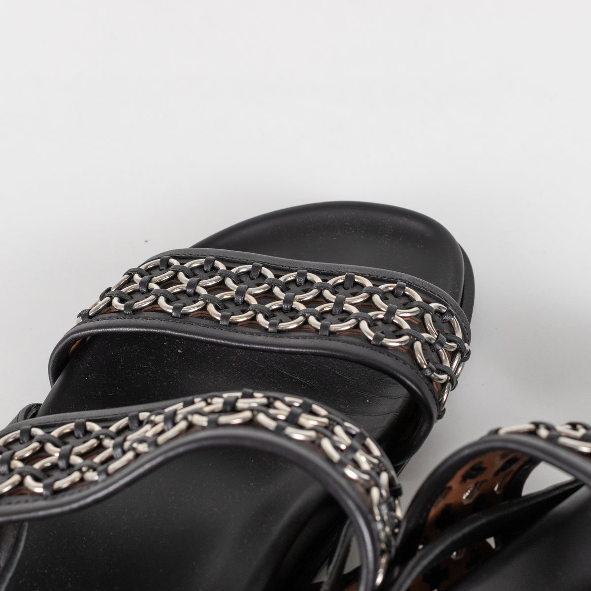 Alaia Black Leather Silver Eyelet Slingback Flat Sandals