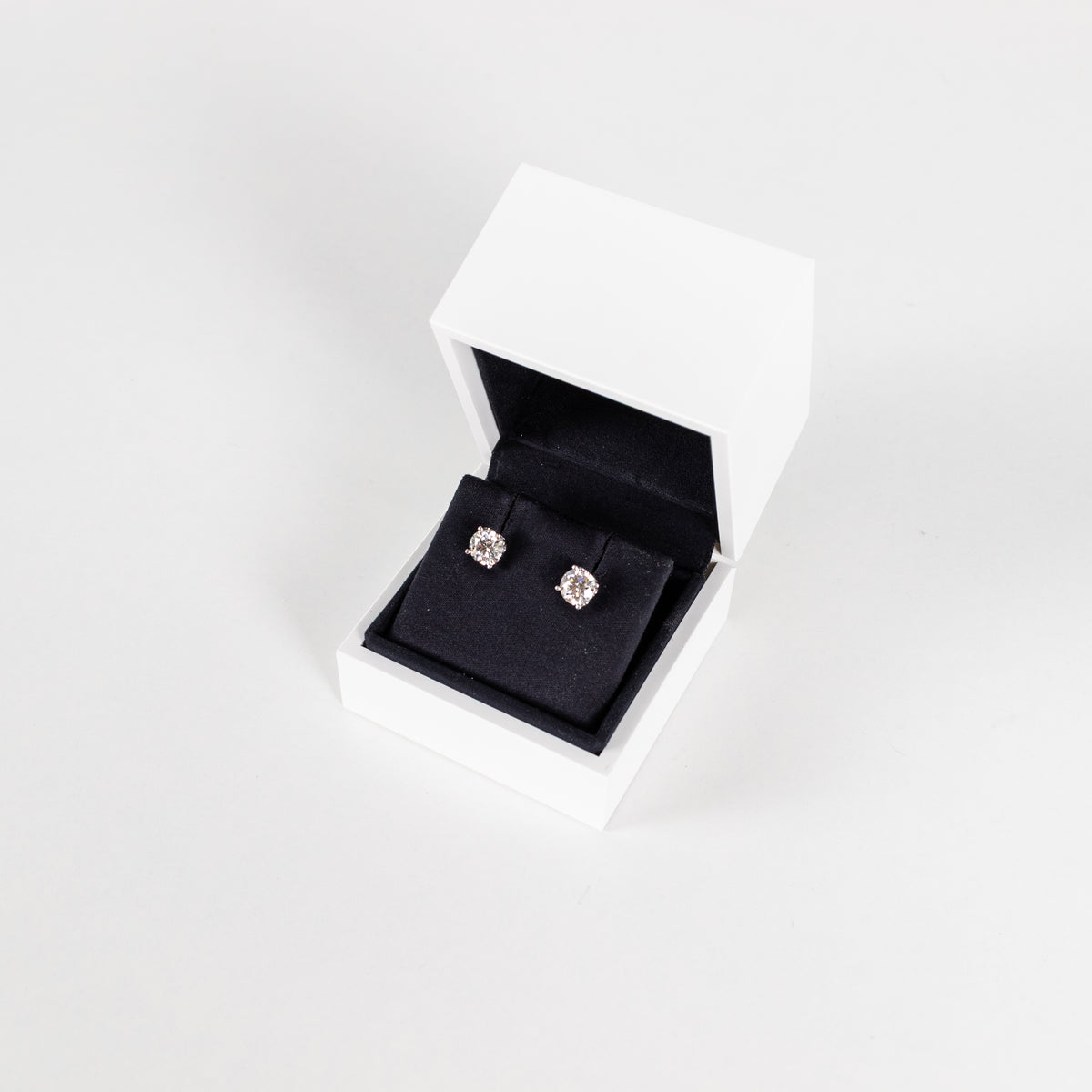 De Beers Signature Solitaire Diamond Stud Earrings