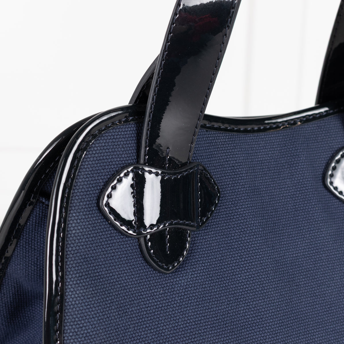 Tila March Navy Bag with Patent Trim