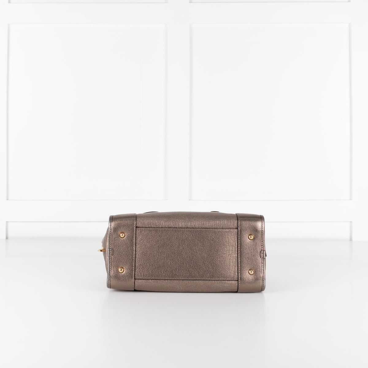 Underneath of the preloved Loewe Gold Tone Amazona Bag
