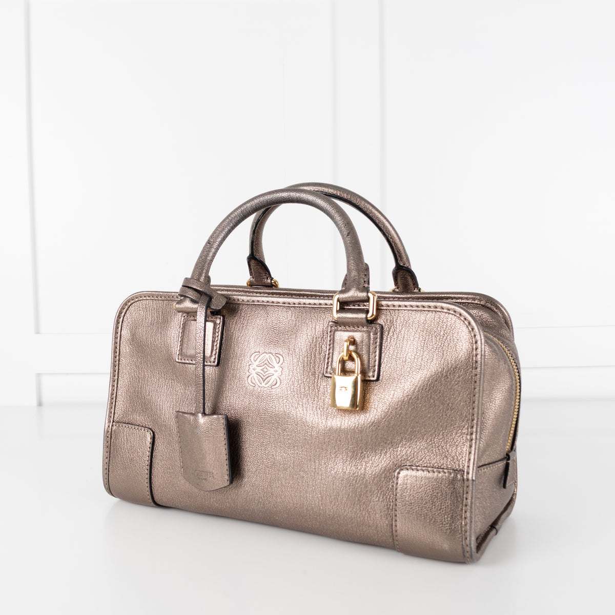 close up side profile of Loewe Gold Tone Amazona Bag