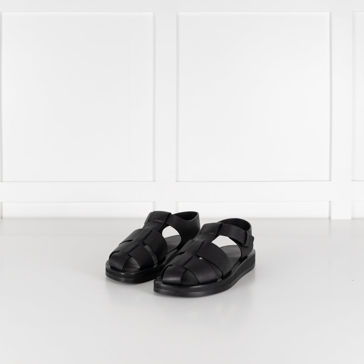 The Row Black Grain Leather Fisherman Flat Sandal