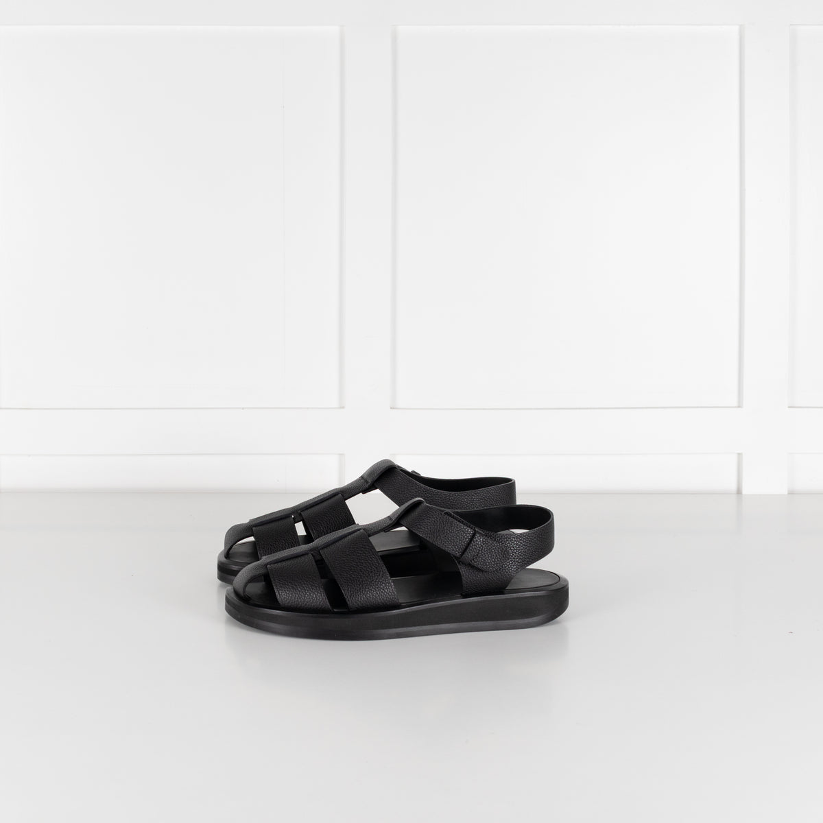 The Row Black Grain Leather Fisherman Flat Sandal