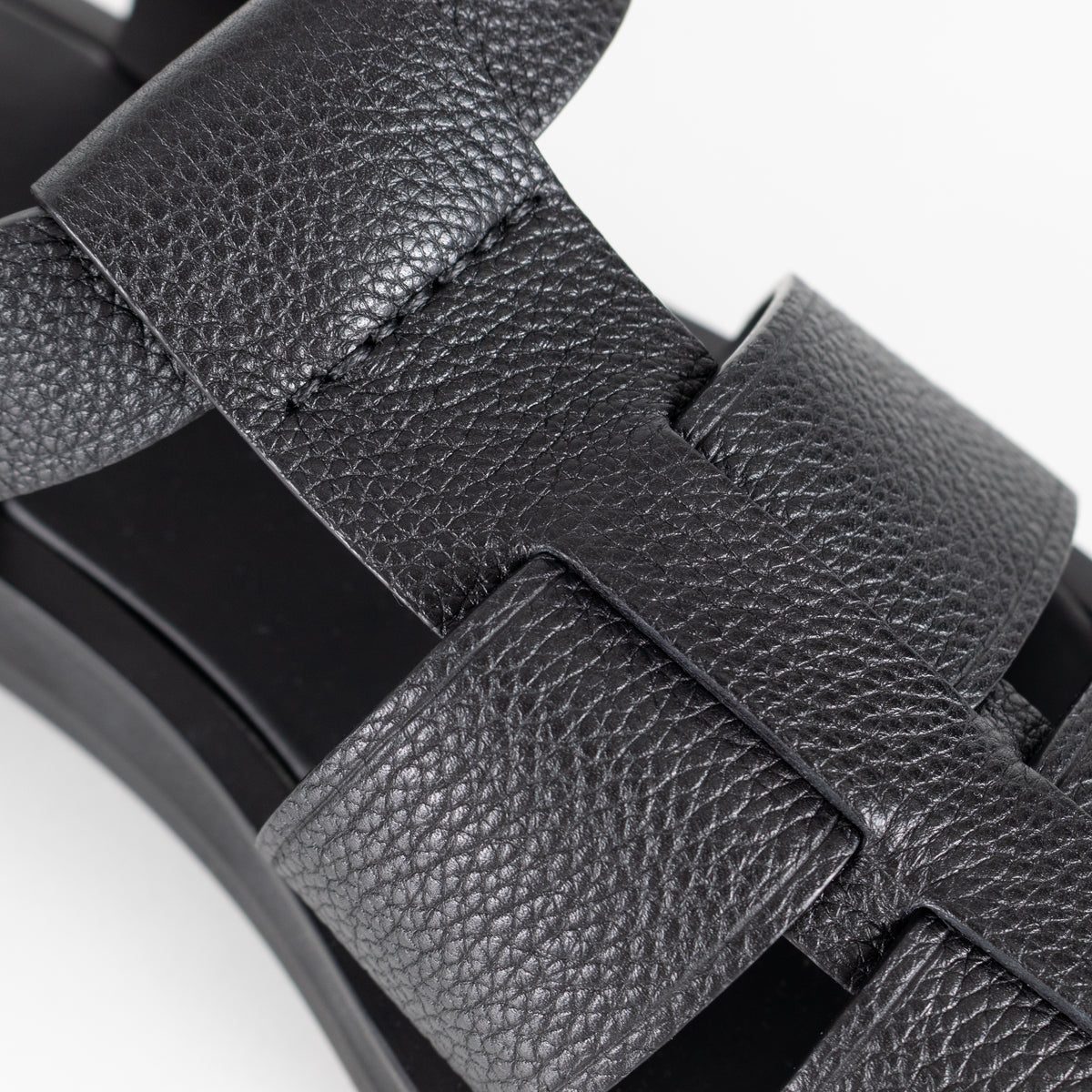The Row Black Grain Leather Fisherman Flat Sandal