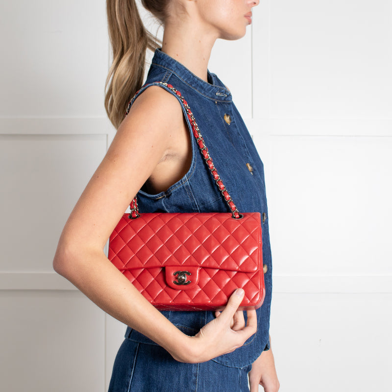 Chanel Red Matelasse Medium Lambskin Double Flap handbag with white background.