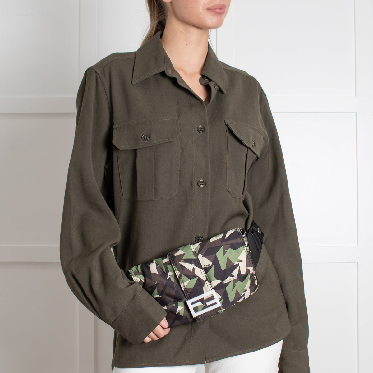 Model wearing pre loved fendi bag.