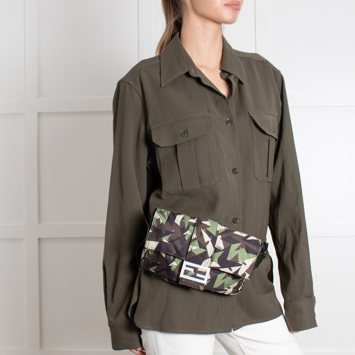Person wearing the preloved Fendi Green Nylon Camouflage Convertible Baguette Satchel as a bumbag.