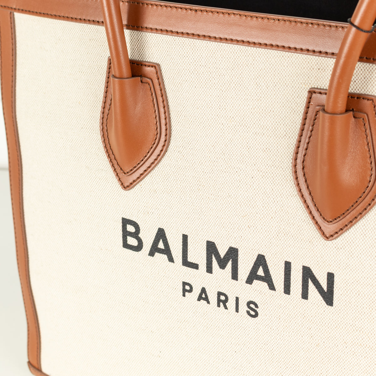 Close-up of Balmain printed logo on canvas