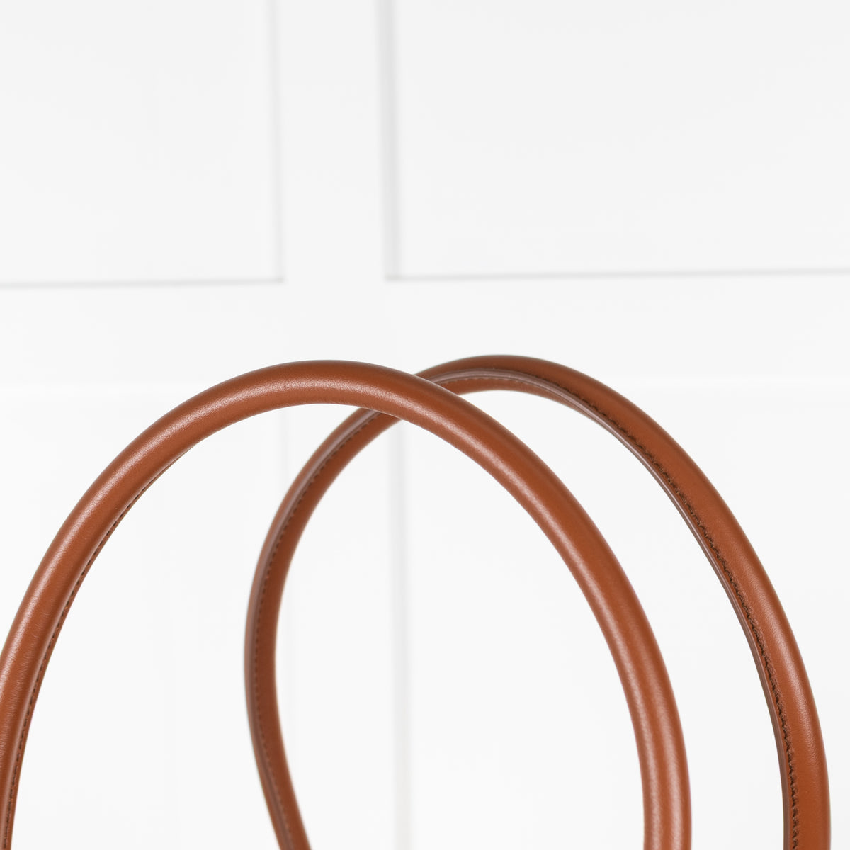 Balmain calfskin leather handles and trim detail