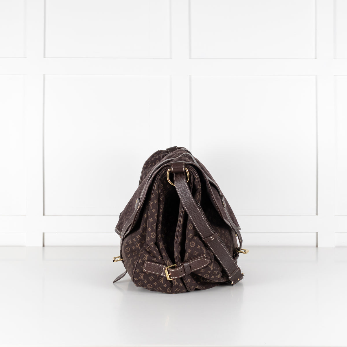 Side profile of Louis Vuitton Brown Monogram Mini Lin Saumur XL Shoulder handbag