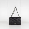 Chanel Black Lambskin Maxi Classic Double Flap Bag