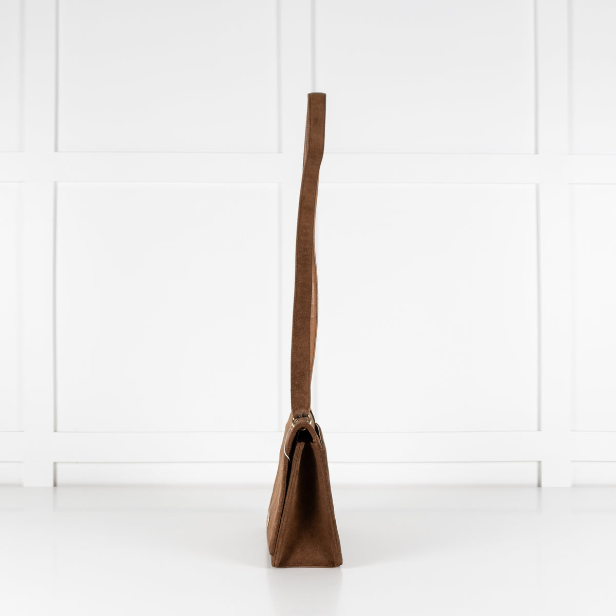 Side profile of Chanel Brown Suede Quilted Flap Handbag.