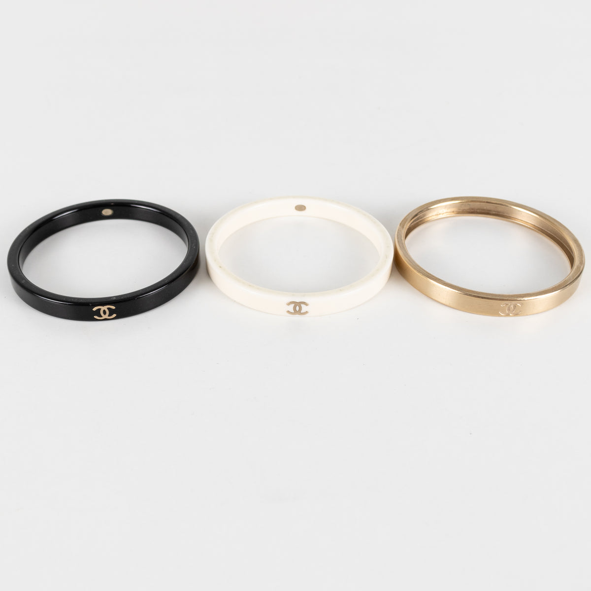 Chanel CC Resin Gold White Black Tone Bangles x3