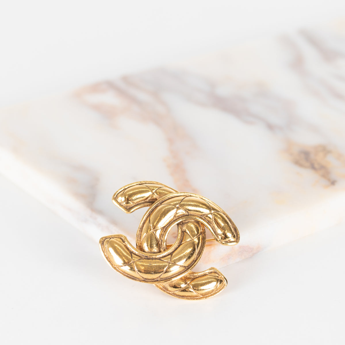 Chanel Gold Tone Quilted Brooch