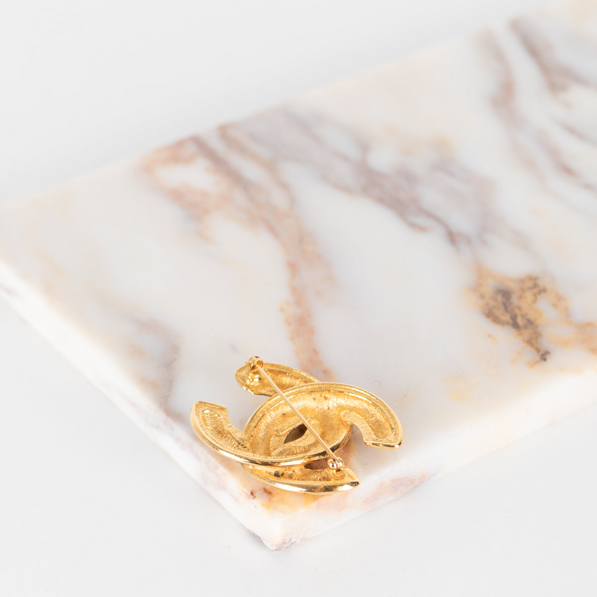 Chanel Gold Tone Quilted Brooch