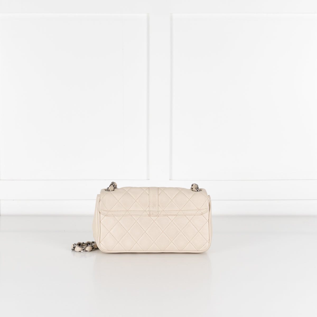 Base of pre loved Chanel vintage Mademoiselle flap handbag.