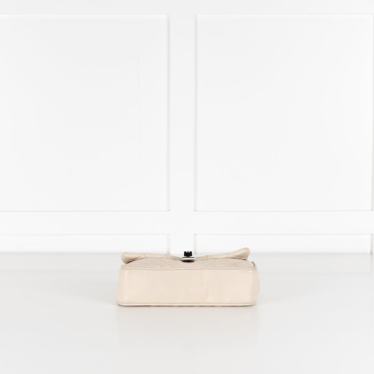 Base of Chanel vintage Mademoiselle flap handbag.