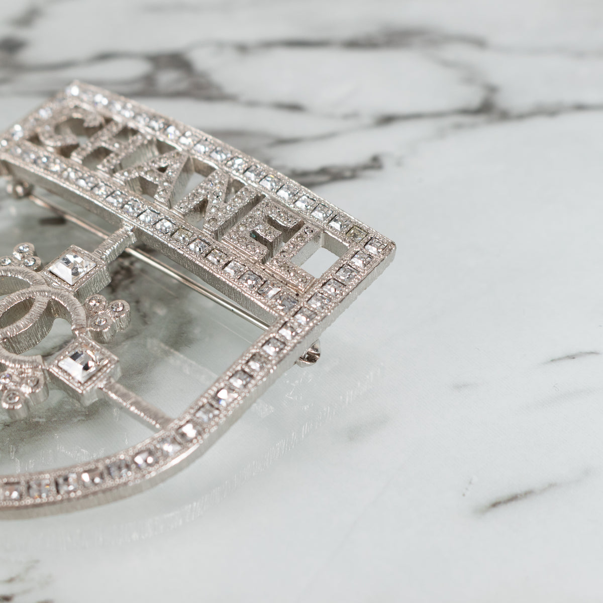 Chanel Silver Crystal Crest Shield Brooch