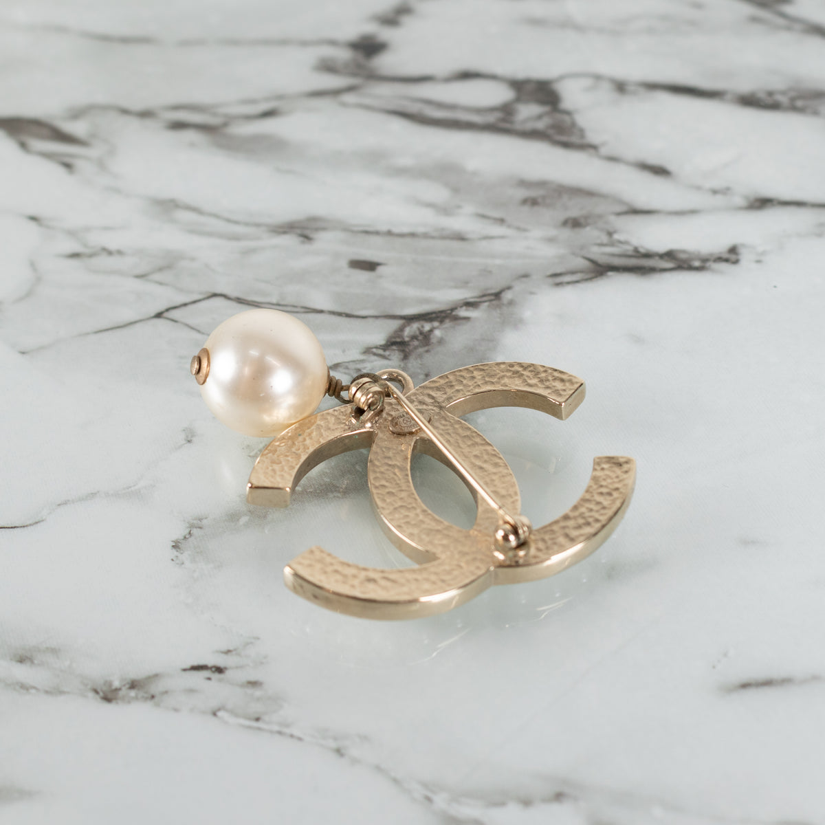 Chanel Gold Tone Faux Pearl CC Brooch