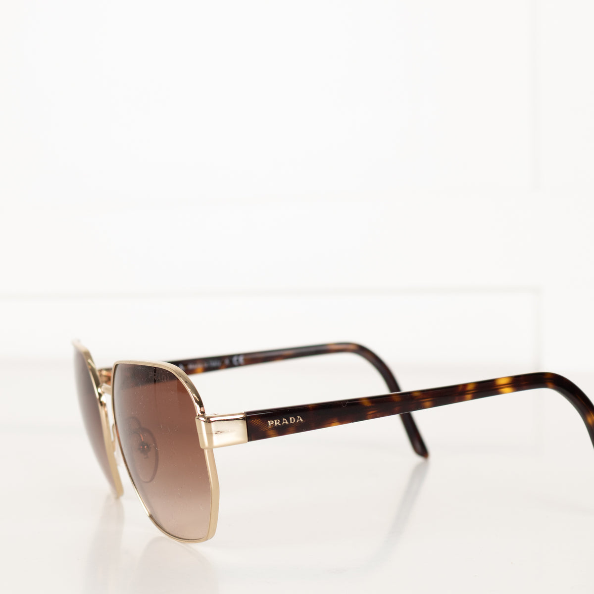 Prada Gold Frame & Brown Lens Sunglasses