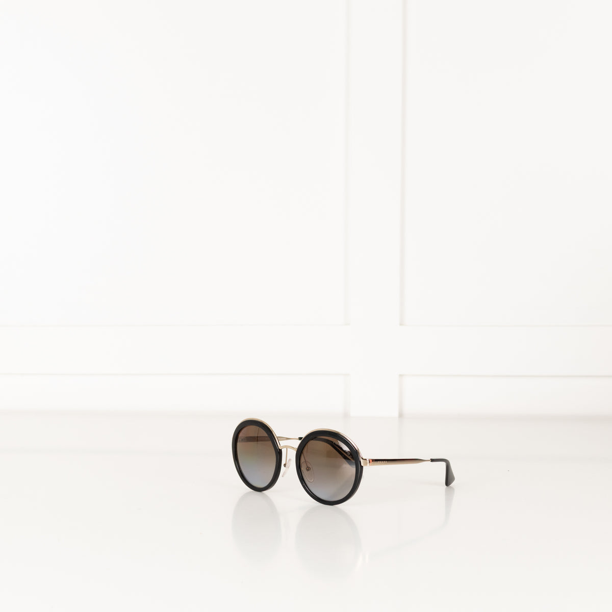 Prada Black & Gold Round Frame Sunglasses