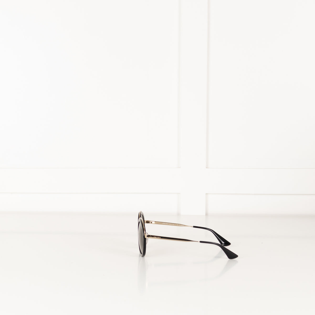 Prada Black & Gold Round Frame Sunglasses