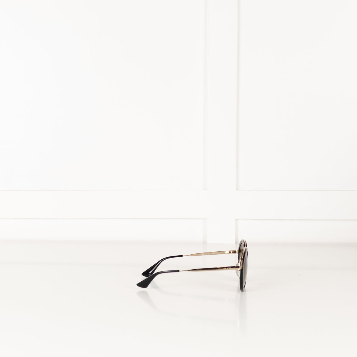 Prada Black & Gold Round Frame Sunglasses