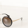 Prada Black & Gold Round Frame Sunglasses