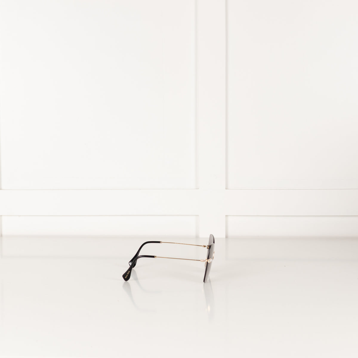 Miu Miu Sunglasses With Gold and Black Arms And Crystal Embellishsments