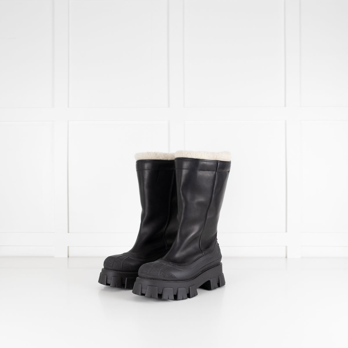 Prada Monolith Shearling Lined Leather Boots