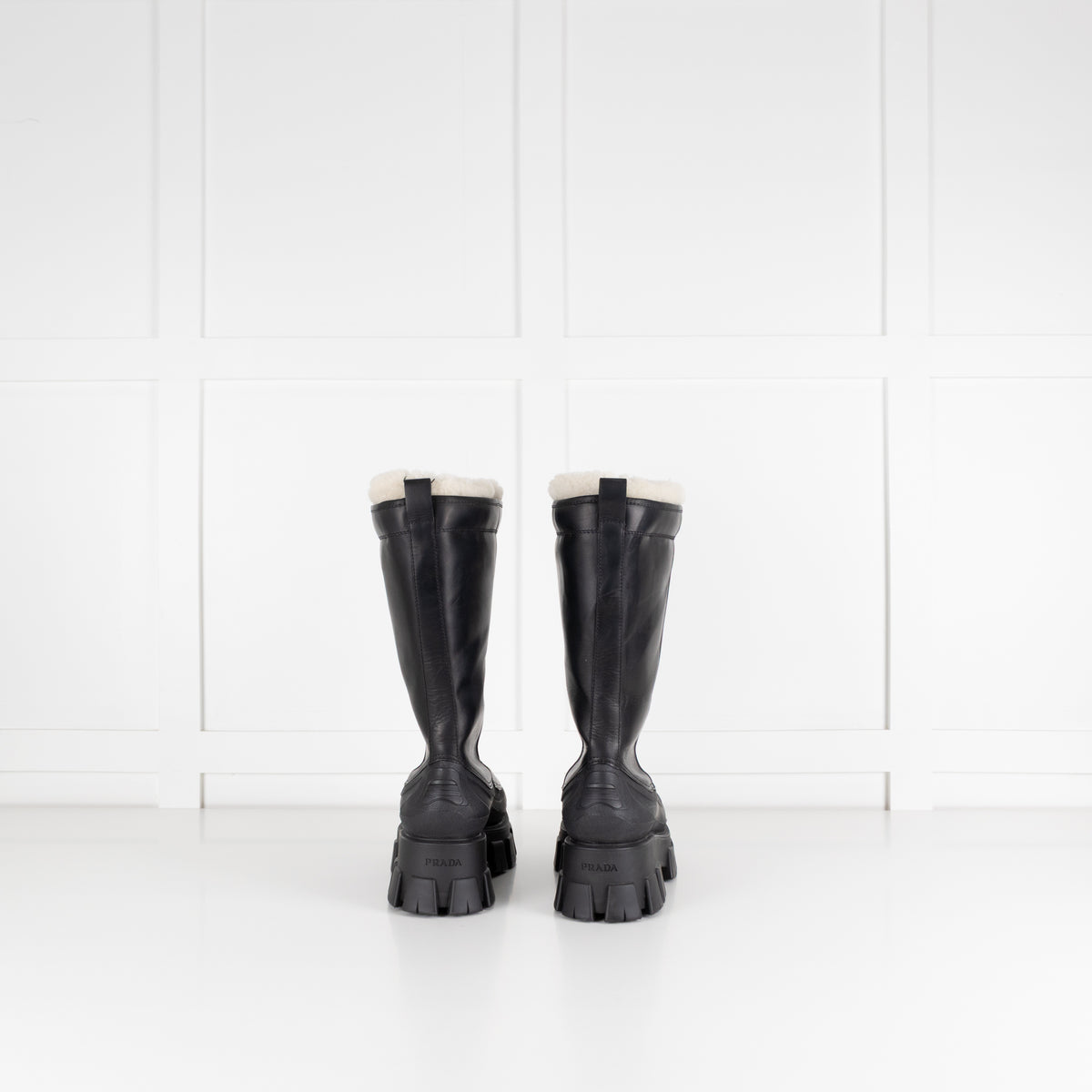 Prada Monolith Shearling Lined Leather Boots