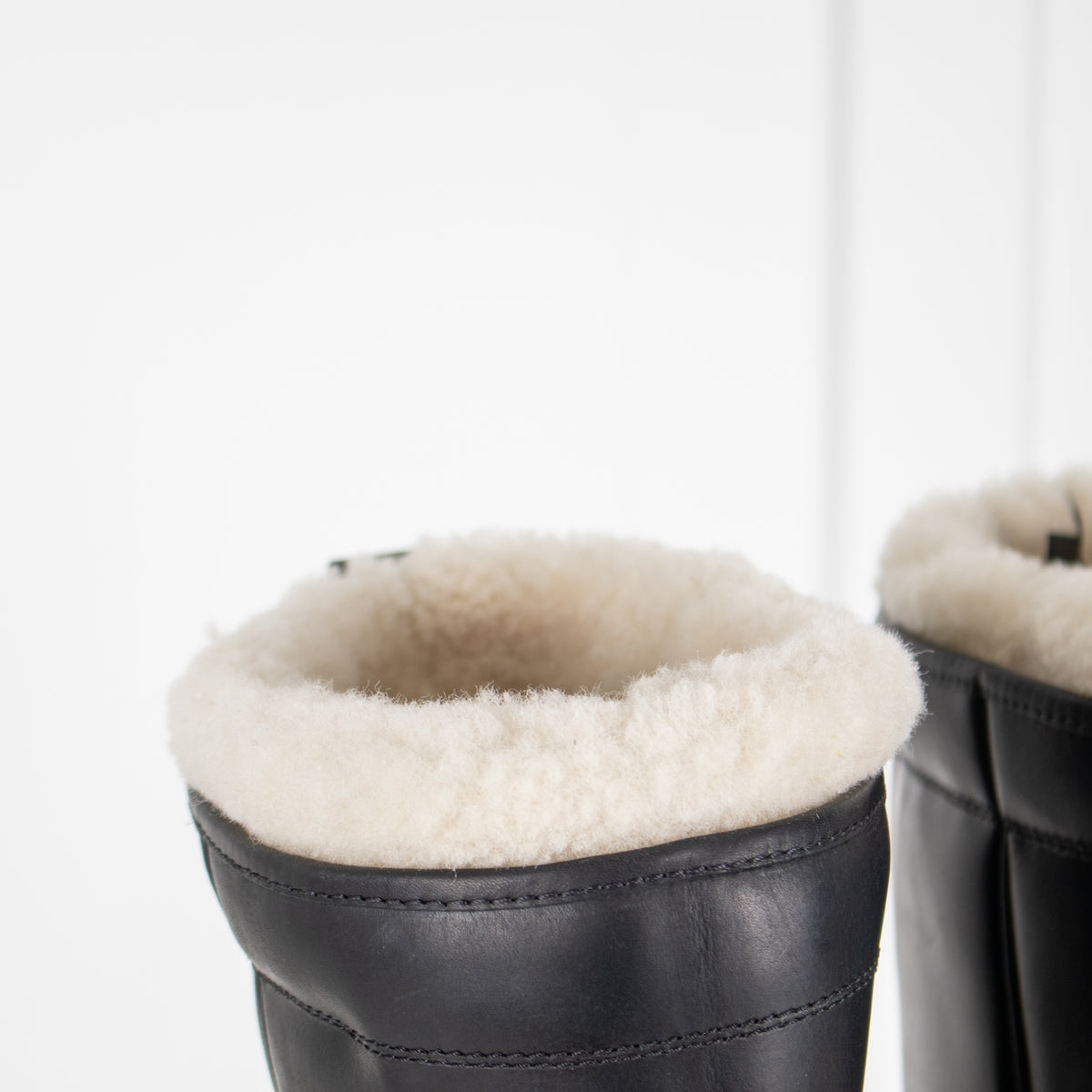 Prada Monolith Shearling Lined Leather Boots