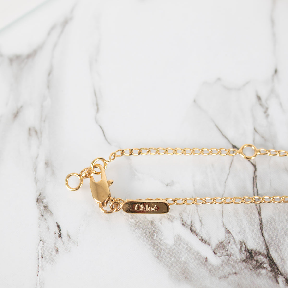 Chloe Femeniste Gold Tone Silhouette Necklace