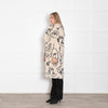Jakke Cream Faux Fur Abstract Faces Coat