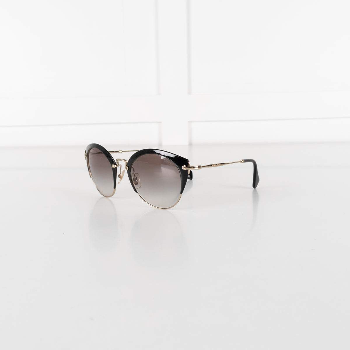 Miu Miu Black And Gold Grey Fade Sunglasses