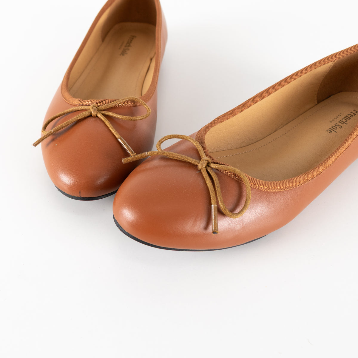 French Sole Tan Leather Ballet Flats With Bow Detail