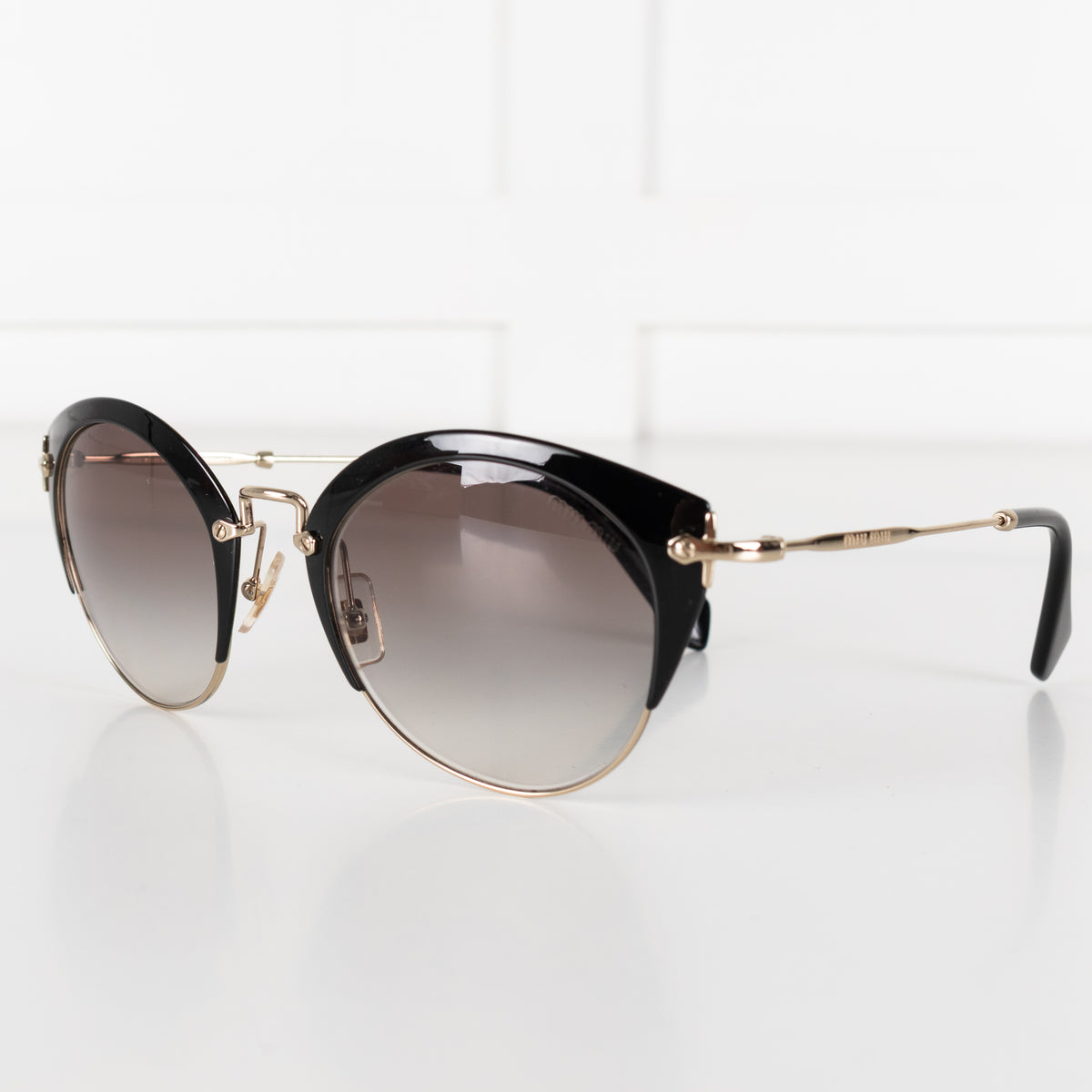 Miu Miu Black And Gold Grey Fade Sunglasses