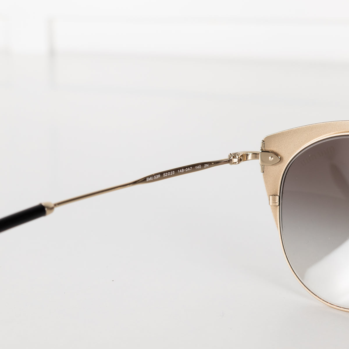 Miu Miu Black And Gold Grey Fade Sunglasses
