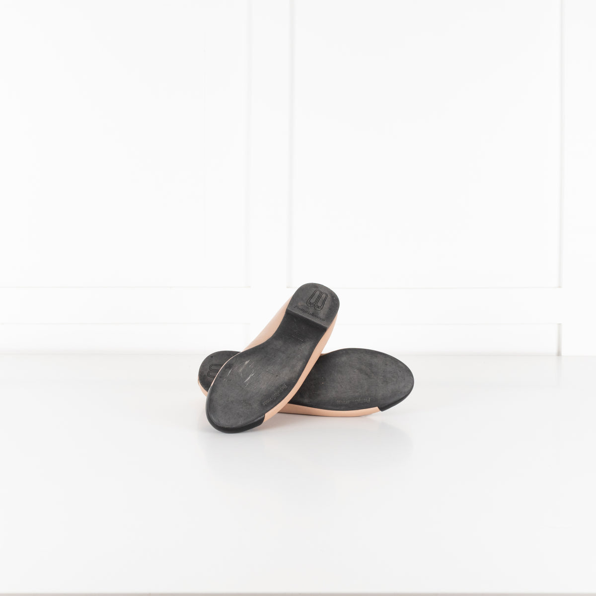 Pretty Ballerinas Nude Ballet Flats With Black Cap-Toe And Bow Detail