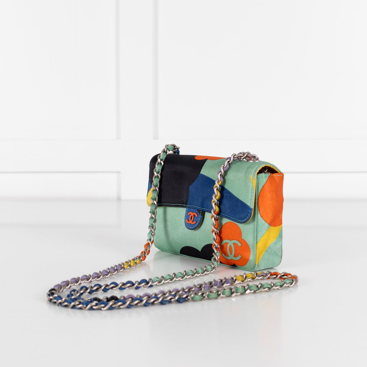 Chanel CC logo clasp on mini quilted satin Coco bag