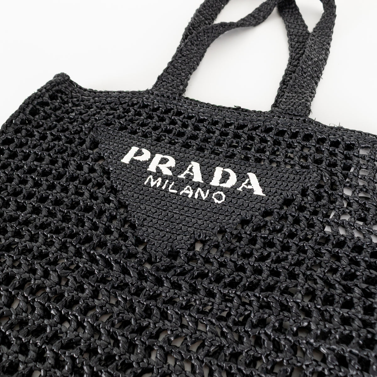 Prada Black White Logo Embellished Crochet Bag